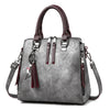 Superior Leather Tassel Cat Pendant Handbag