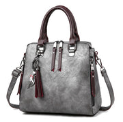 Superior Leather Tassel Cat Pendant Handbag