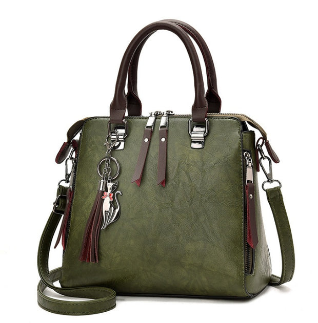 Superior Leather Tassel Cat Pendant Handbag