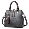 Superior Leather Tassel Cat Pendant Handbag