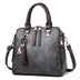 Superior Leather Tassel Cat Pendant Handbag