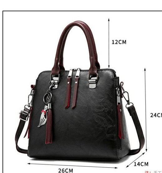 Superior Leather Tassel Cat Pendant Handbag