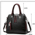 Superior Leather Tassel Cat Pendant Handbag