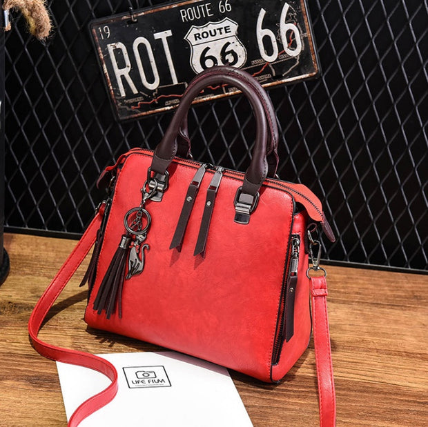 Superior Leather Tassel Cat Pendant Handbag