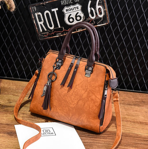 Superior Leather Tassel Cat Pendant Handbag