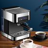 All-in-one espresso machine with milk frother on a wooden table with cups of coffee.